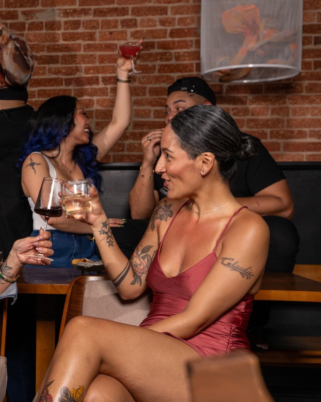 A table mid-laugh at Sulod